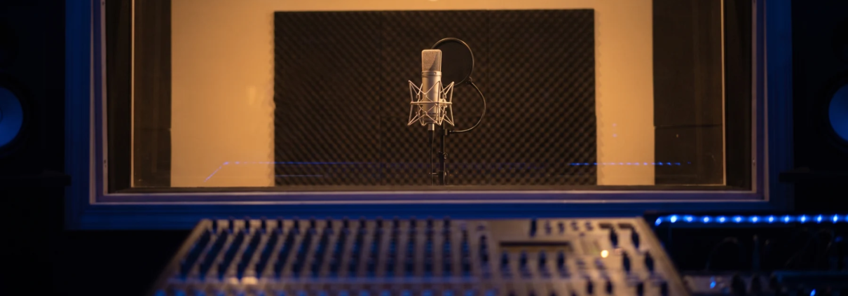 Recording booth with a condenser microphone used for Arabic voice-over and dubbing