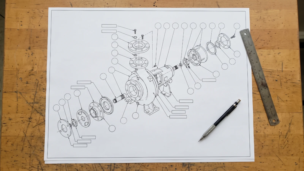 Exploded-view pump drawing with numbered callouts on a drafting desk