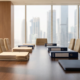 Conference table with stacks of company documents and binders, city skyline in the background