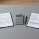 Two open financial report booklets side by side on a desk, representing English and Arabic versions